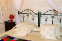 Posteľ alebo postele v izbe v ubytovaní Relais Villa Lucia