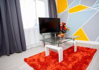 TV a/nebo společenská místnost v ubytování Oasis Place