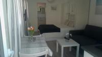 Posedenie v ubytovaní Mar&Mar, apartamento con solárium y piscina