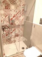 Kúpeľňa v ubytovaní Frattina FF italian suites