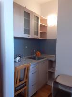 A kitchen or kitchenette at Gelov Hotel
