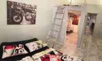 Posteľ alebo postele v izbe v ubytovaní Marilyn City Center