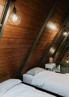 villa tibraにあるベッド