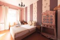 Cama ou camas em um quarto em Sunset Destination Hostel