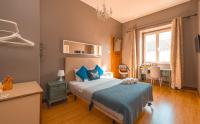 Cama ou camas em um quarto em Sunset Destination Hostel