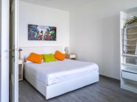 A bed or beds in a room at Apartment Tramonto - SEA116 by Interhome