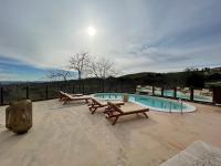 The swimming pool at or close to Dimora Rosso Piceno