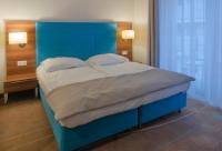 Posteľ alebo postele v izbe v ubytovaní Holiday Home Aparthotel z balkonem przy plaży