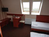 Łóżko lub łóżka w pokoju w obiekcie Hotel Wielkopolanka