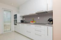Kuchyň nebo kuchyňský kout v ubytování Apartments Radeljić