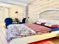 Posteľ alebo postele v izbe v ubytovaní Apartament Mercado Central