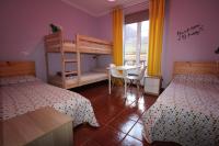 Postel nebo postele na pokoji v ubytování Hostel GoodHouse Gijón