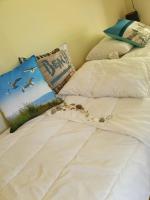 Łóżko lub łóżka w pokoju w obiekcie Bárka a Tiszához apartman