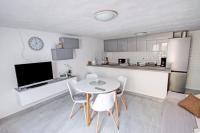 Kuchyňa alebo kuchynka v ubytovaní Apartments Kondrić