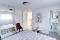 Posteľ alebo postele v izbe v ubytovaní Apartments Kondrić