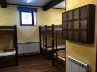Postel nebo postele na pokoji v ubytování Albergue Villa de Bulnes