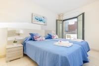 Postel nebo postele na pokoji v ubytování Apart-rent Apartamento Francesc Macia 2003