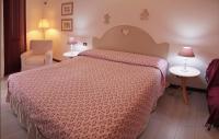 Posteľ alebo postele v izbe v ubytovaní Casa Margherita Affittacamere B&B