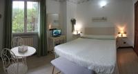 Posteľ alebo postele v izbe v ubytovaní Casa Margherita Affittacamere B&B
