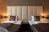 Ein Bett oder Betten in einem Zimmer der Unterkunft Mauritius Hotel & Therme
