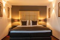 Ein Bett oder Betten in einem Zimmer der Unterkunft Mauritius Hotel & Therme