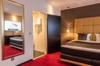 Ein Bett oder Betten in einem Zimmer der Unterkunft Mauritius Hotel & Therme