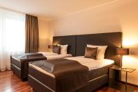 Ein Bett oder Betten in einem Zimmer der Unterkunft Mauritius Hotel & Therme