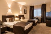 Ein Bett oder Betten in einem Zimmer der Unterkunft Mauritius Hotel & Therme