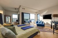 Televízia a/alebo spoločenská miestnosť v ubytovaní Boutique Hotel Valsabbion
