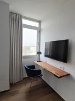 Appartements Lamblinにあるテレビまたはエンターテインメントセンター