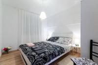 Posteľ alebo postele v izbe v ubytovaní Apartments in Dramalj 39504