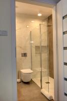 Kúpeľňa v ubytovaní Apartamenty KORAL