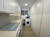 A kitchen or kitchenette at Ático en primerísima linea de playa!!!