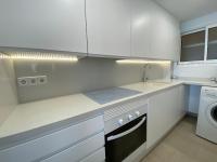 A kitchen or kitchenette at Ático en primerísima linea de playa!!!
