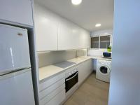 A kitchen or kitchenette at Ático en primerísima linea de playa!!!