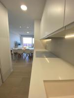 A kitchen or kitchenette at Ático en primerísima linea de playa!!!