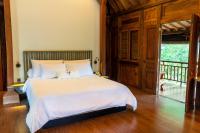 Tira Vilagna Suites & Spaにあるベッド