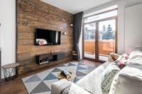 Televízia a/alebo spoločenská miestnosť v ubytovaní WILLA JAROSTA & SPA, AC -free parking