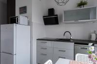 Kuchyňa alebo kuchynka v ubytovaní APARTAMENT Piątka