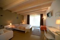 Posteľ alebo postele v izbe v ubytovaní Agriturismo Maso Grener