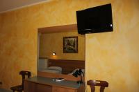 A television and/or entertainment centre at Albergo Napoleone