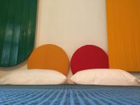 A bed or beds in a room at Hotel Pelaghea