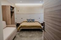 A bed or beds in a room at Miryam House Affittacamere Suite e Relax