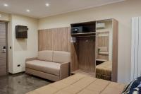 A television and/or entertainment centre at Miryam House Affittacamere Suite e Relax