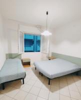 A bed or beds in a room at Residence Stella Polare