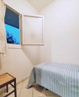 A bed or beds in a room at Residence Stella Polare