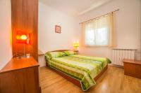 Posteľ alebo postele v izbe v ubytovaní Apartments Đurđa