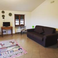 Televízia a/alebo spoločenská miestnosť v ubytovaní La casa di Gina
