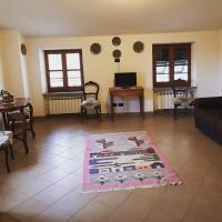 Televízia a/alebo spoločenská miestnosť v ubytovaní La casa di Gina