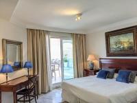 Postel nebo postele na pokoji v ubytování Coral Beach Aparthotel